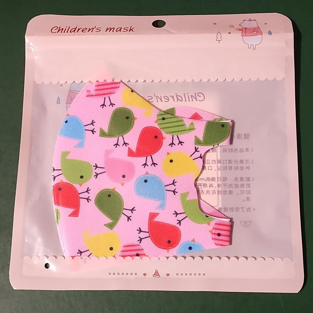 Children's re Usable face mask new in package never opened
